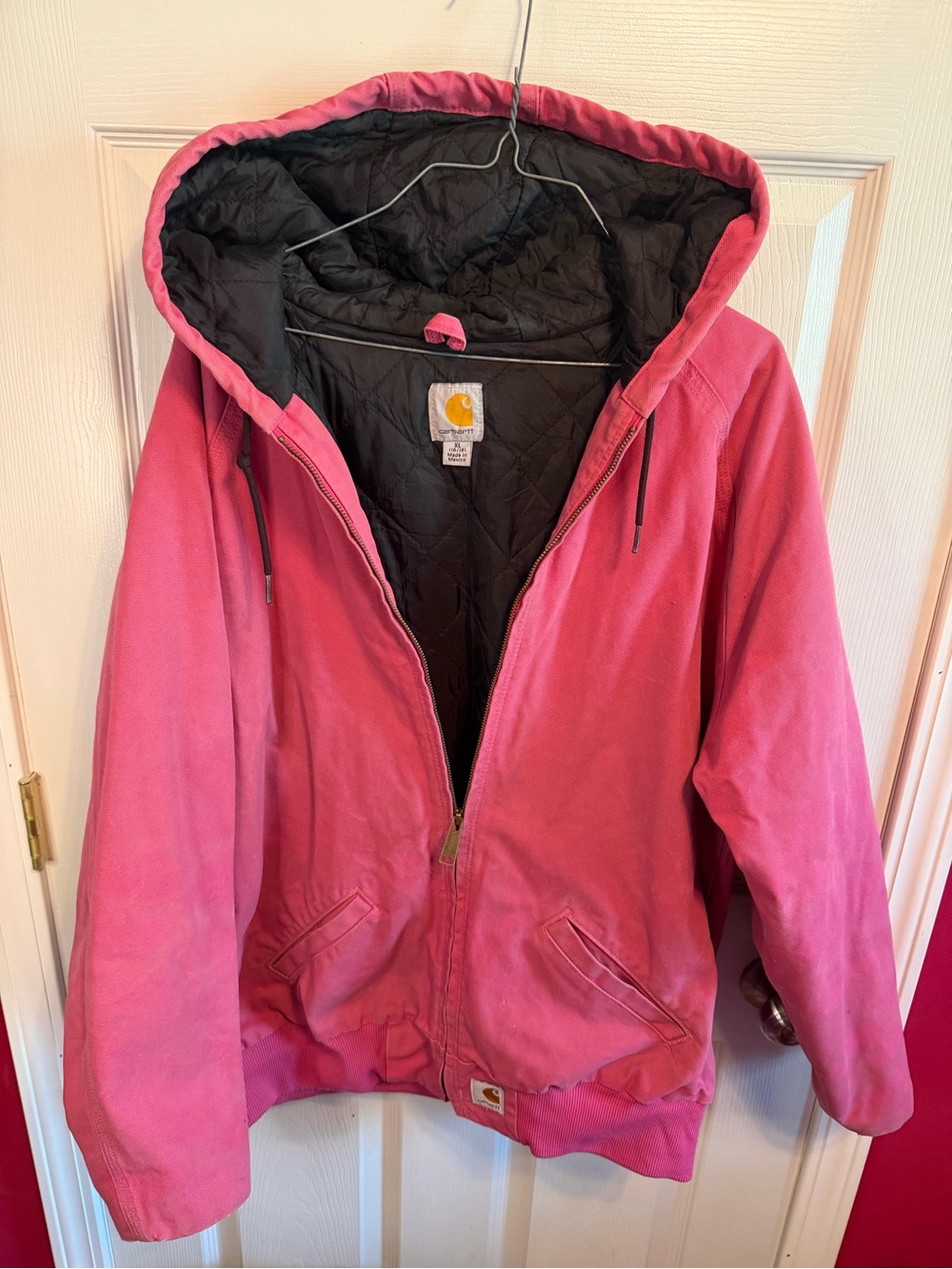 Vintage Carhartt women’s Pink Hooded Jacket with Black Lining
